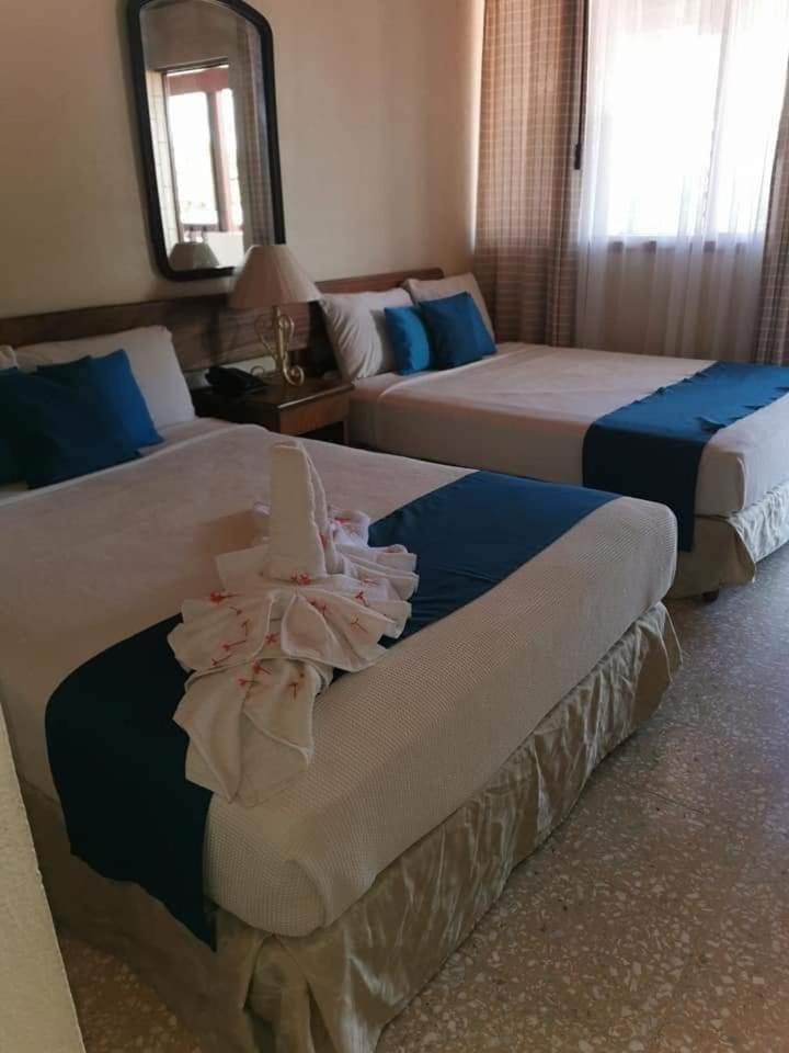 Hotel La Siesta Либерия Номер фото